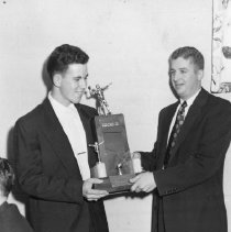 Jim Lothery Receives Lions Club Trophy for Most Valuable Player Award